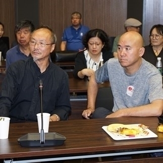 Lü (Lyu) Shengzhong (left) worked with Ai An. Courtesy of Ai An.