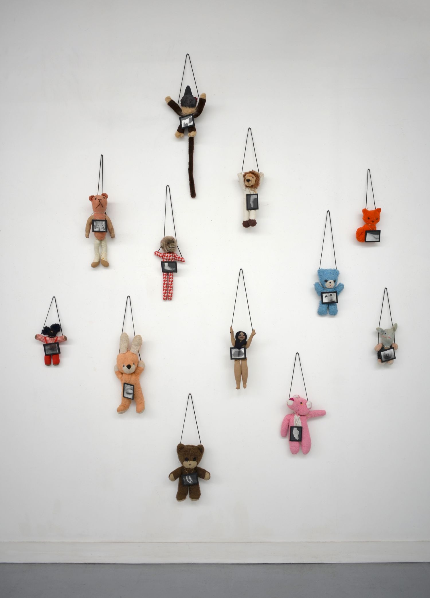 Annette Messager 12 Little Effigies 1990.jpg