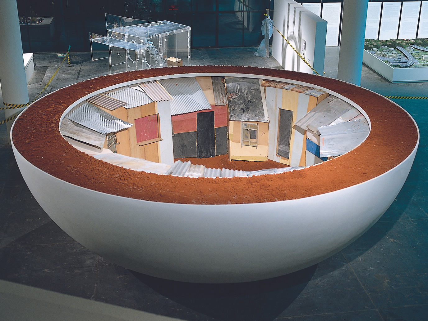 Huang Yongping & Shen Yuan, Flying Bowl, 2002. Wood, iron, fiberglass, soil, 800x800x275cm.png